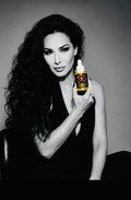 Rashel Miracle Products Rosemary Hair Growth and Scalp Strengthening Oil bottle with rosemary sprigs and dropper applicator