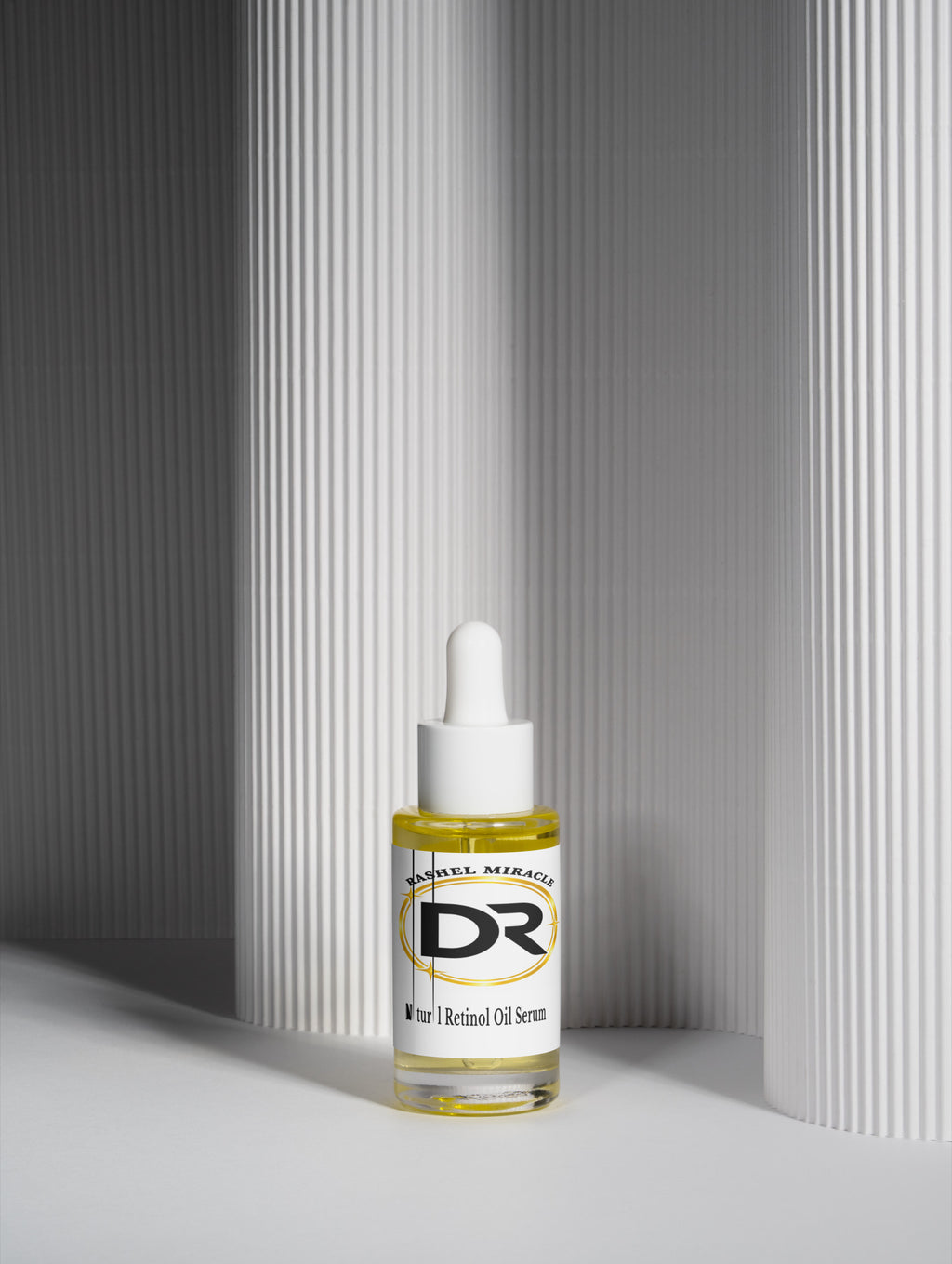 Rashel Miracle Natural Retinol Bakuchiol Face Oil bottle on white monumental background