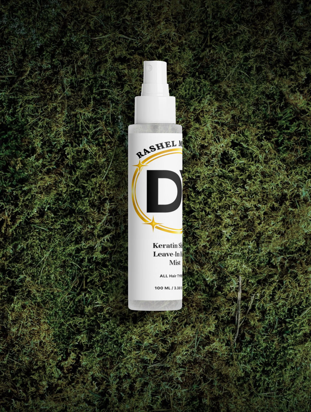 Rashel Miracle Keratin Shine Leave-In Hair Mist Spray bottle on natural moss background